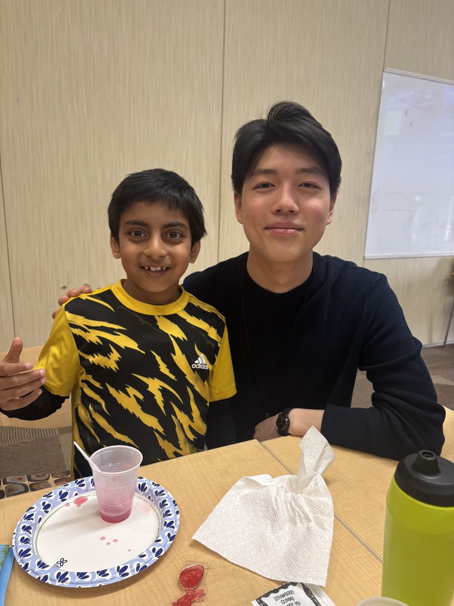 Team member with a student